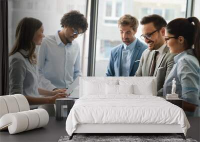 Portrait of successful business team working in office Wall mural