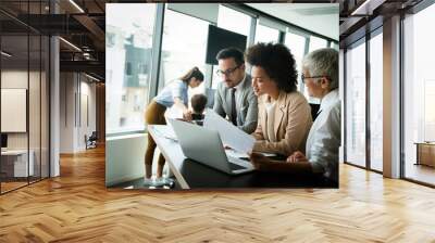 Portrait of successful business team working in office Wall mural