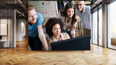 Programmer working in a software developing company office Wall mural