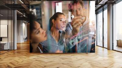 programmers cooperating at it company developing apps Wall mural