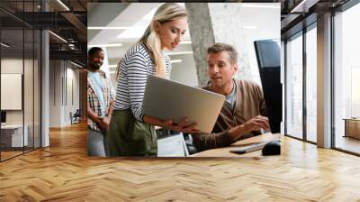 Programmers working in a software developing company office Wall mural