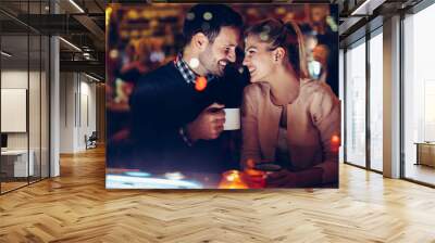 romantic couple dating in pub at night Wall mural