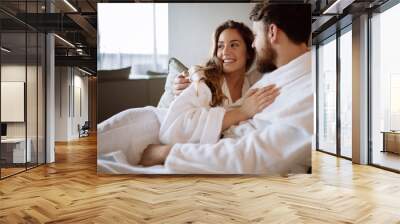 Romantic couple enjoying honeymoon Wall mural