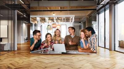 Startup business team on meeting in modern bright office interior and working together Wall mural