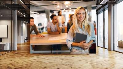 Successful company with happy employees in modern office Wall mural