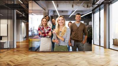 Successful group of designers, business people at work in office Wall mural