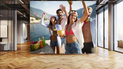 Summer joy and friendship concept with young people on vacation Wall mural