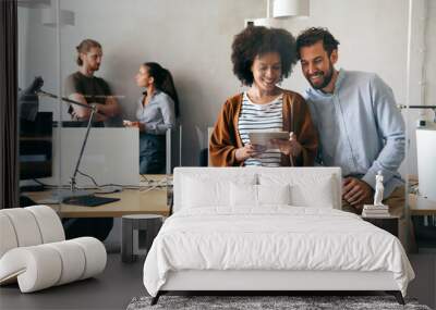 Young startup business people having fun, working and chatting at workplace office Wall mural