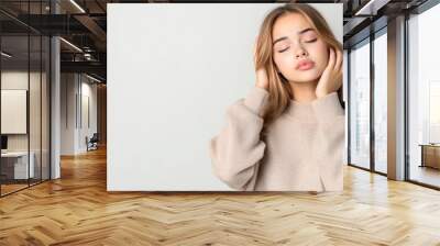 Portrait of Beautiful Young Woman with Closed Eyes Wall mural