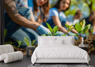 A group of volunteers planting a tree on environment day Wall mural