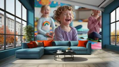 Laughing children learn yoga on colorful mats at a day care center, charging for a day of fun and wellness. Wall mural