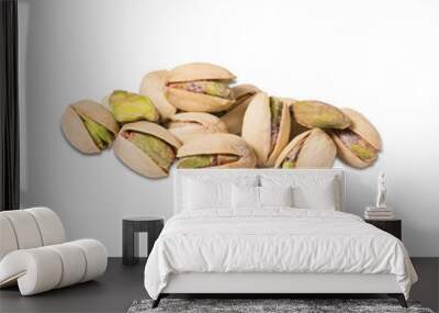 Composition of pistachios on the white background Wall mural