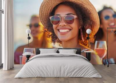 Happy young black woman at a summer beach party smiling and holding a cocktail or wine Wall mural