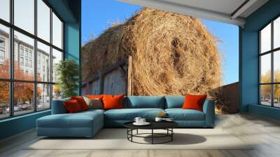 Large sheaf of hay in the back of an old truck Wall mural