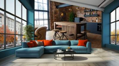 Side view on a wooden table and spacious industrial loft kitchen with vintage decor and black cabinets Wall mural