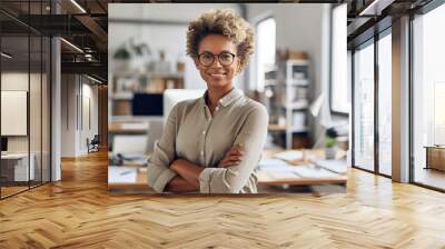 A designer professional woman in an office wearing glasses Wall mural