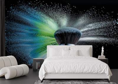 A makeup brush coated with vibrant colored powder, creating a striking visual effect against a neutral background. Wall mural