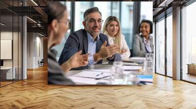 Business Meeting, Group of People Engaged in Table Discussion Wall mural