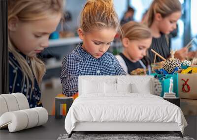 Children making handmade gifts during a winter workshop Wall mural