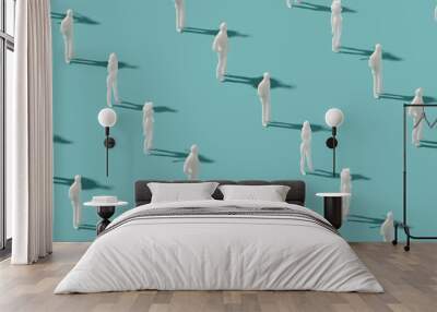 Plastic human figurines arranged on a pastel blue background. Futuristic society minimal pattern Wall mural