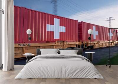 Swiss export. Running train loaded with containers with the flag of China.  Wall mural