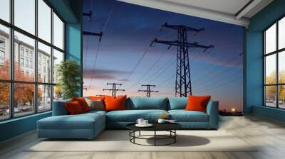 Transmission of energy from a power plant to a city.  Wall mural