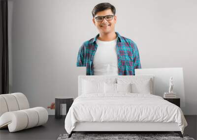  Indian/Asian Young Man showing blank signboard on White background Wall mural