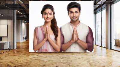 indian couple doing namaste or welcoming gesture. Wall mural