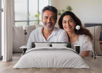 Indian couple smiling while hugging each other Wall mural