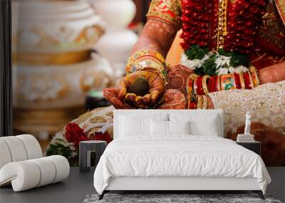 Indian wedding  photography ,groom and bride hands Wall mural