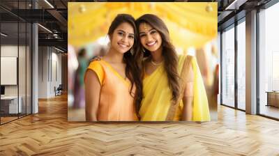 Two female sisters or friends wearing traditional saree and smiling Wall mural