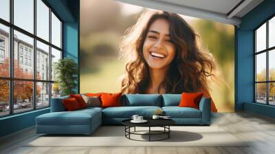 Young beautiful woman smiling and giving happy expression Wall mural