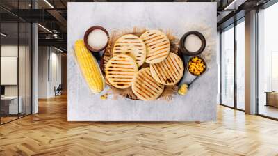  Top view of arepas made with corn flour, Latin American food concept Wall mural