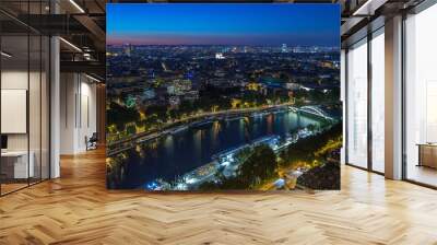 Aerial Night timelapse view of Paris City and Seine river shot on the top of Eiffel Tower Wall mural