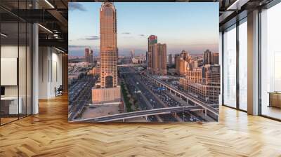 Skyline internet city with crossing Sheikh Zayed Road aerial day to night timelapse Wall mural