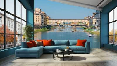 The Ponte Vecchio on a sunny day timelapse, a medieval stone segmental arch bridge over the Arno River in Florence, Italy Wall mural