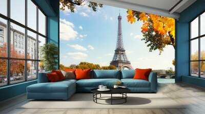 eiffel tour over seine river with fall tree, paris, france Wall mural