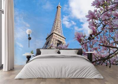 Eiffel Tower with blooming magnolia spring flowers, Paris, France Wall mural