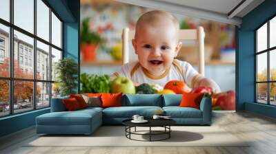 Healthy cute caucasian baby boy have, eat vegan raw supplementary food at home in his highchair. Wall mural