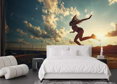 High jump, woman and fitness with exercise, sport and athlete in a competition outdoor. Wall mural