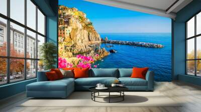 Manarola picturesque town and sea of Cinque Terre at summer with blooming flowers, Italy Wall mural