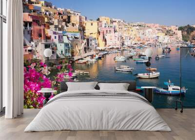 Procida island colorful town with harbor at summer with flowers, Italy Wall mural