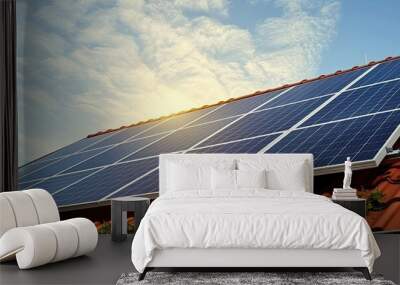 renewable energy concept, power generated by rooftop solar panels on old house roof. Wall mural