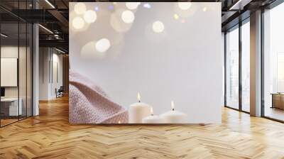 White burning advent candles with christmas decorations and bokeh lights Wall mural