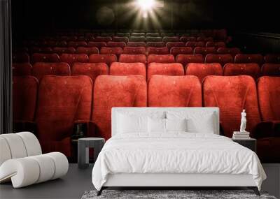 Empty comfortable red seats with numbers in cinema Wall mural