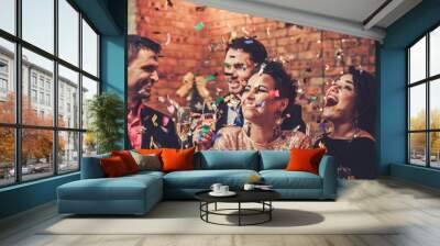 Happy beautiful couples celebrating Christmas Wall mural