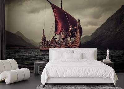 vikings are floating on the sea on drakkar with mountains on the Wall mural