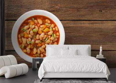 Baked beans in tomato sauce and greens. Wall mural