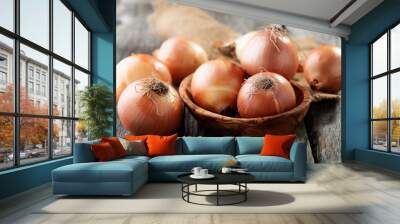 Fresh raw onions on wooden background.  Wall mural