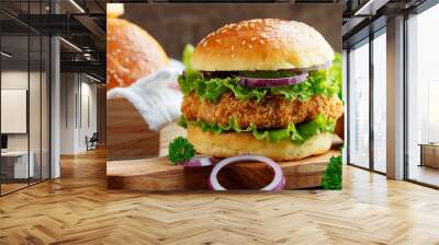 Fresh tasty chicken burger on wood table. Wall mural